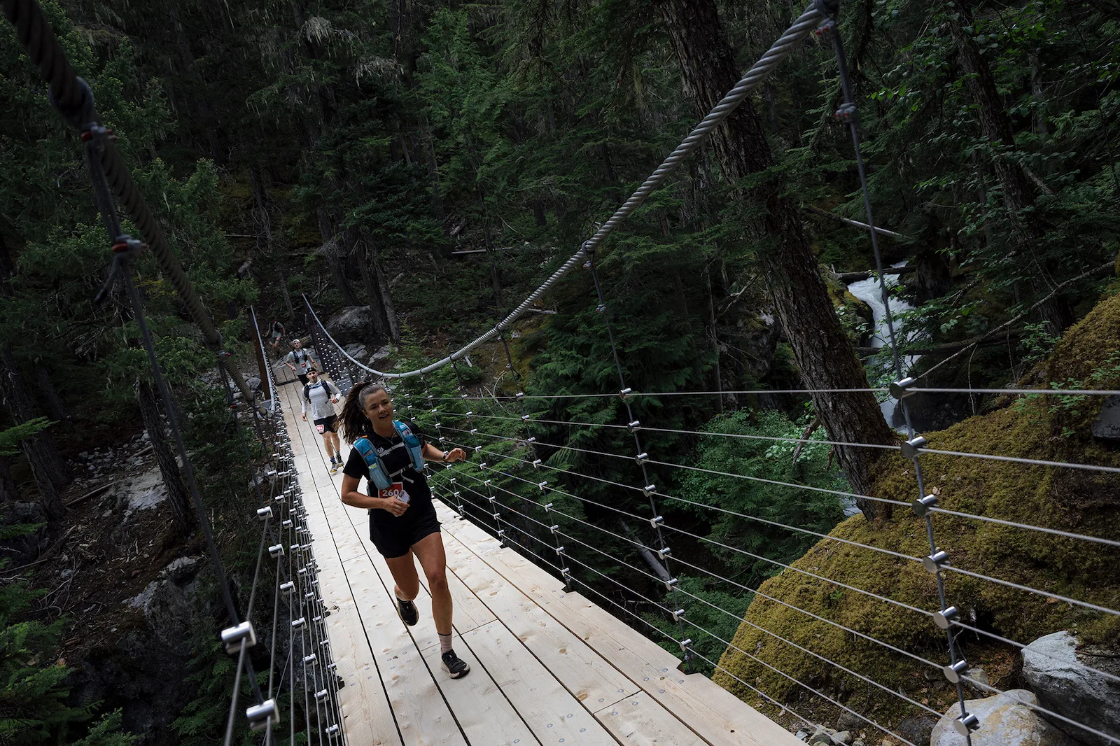 Trail runners on Whistler singletrack